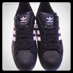 Black Adidas with shell top.